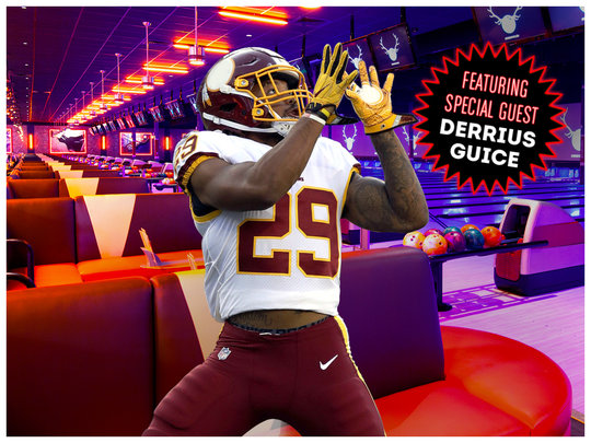 Derrius Giuce in front of bowling lanes