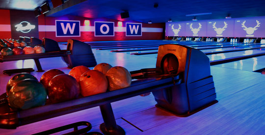 view from the ball return down bowling lanes