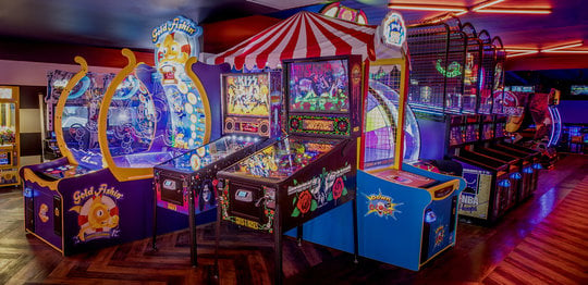 Arcade games with neon lighting