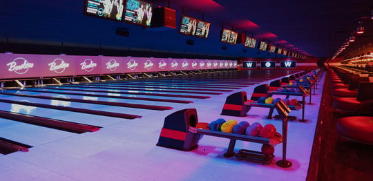 Ball return with bowling balls and lanes