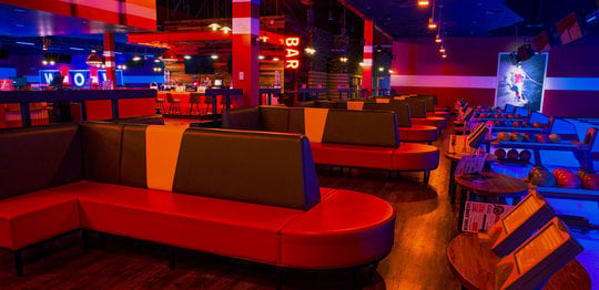 Bowling lanes and seating at Bowlero St. Peters