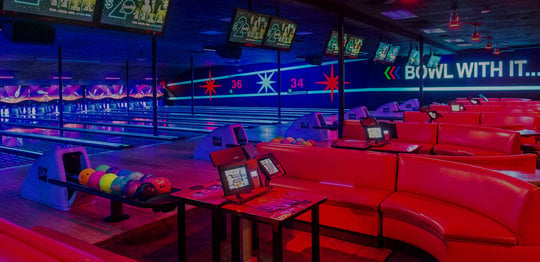 Lanes and plush red couches at Bowlero Wallington
