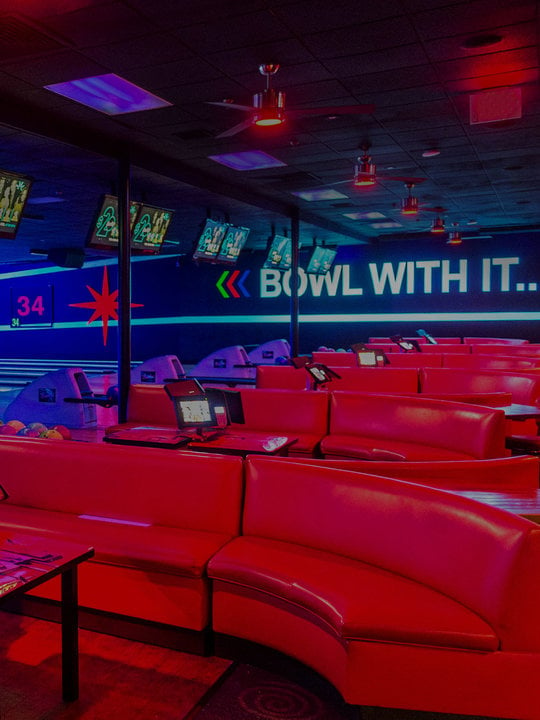 Lanes and plush red couches at Bowlero Wallington
