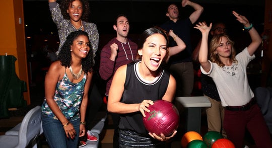 Group of Friends Bowling Together
