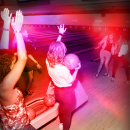 Girls cheering and dancing on lanes