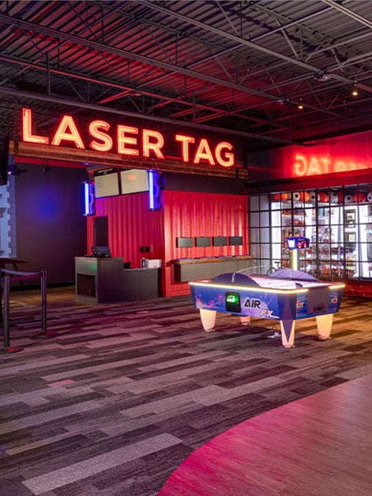 Laser Tag sign, games, and prizes