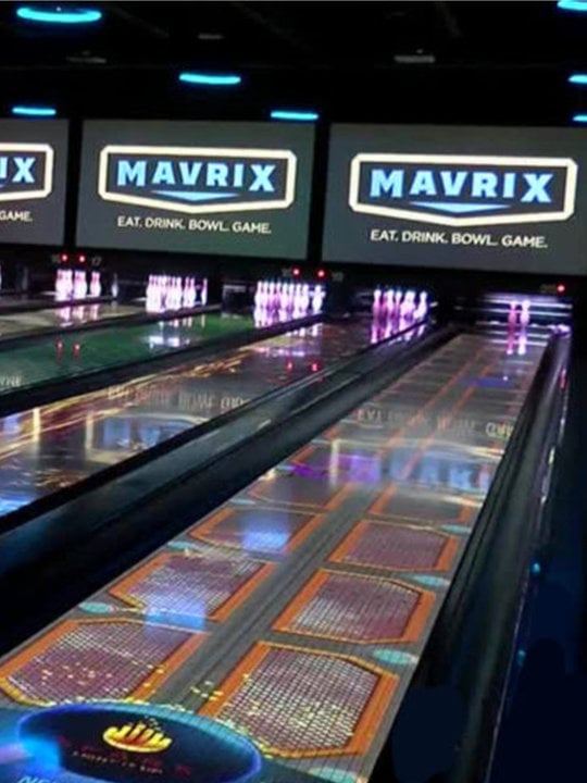 Colorfully lit bowling lanes